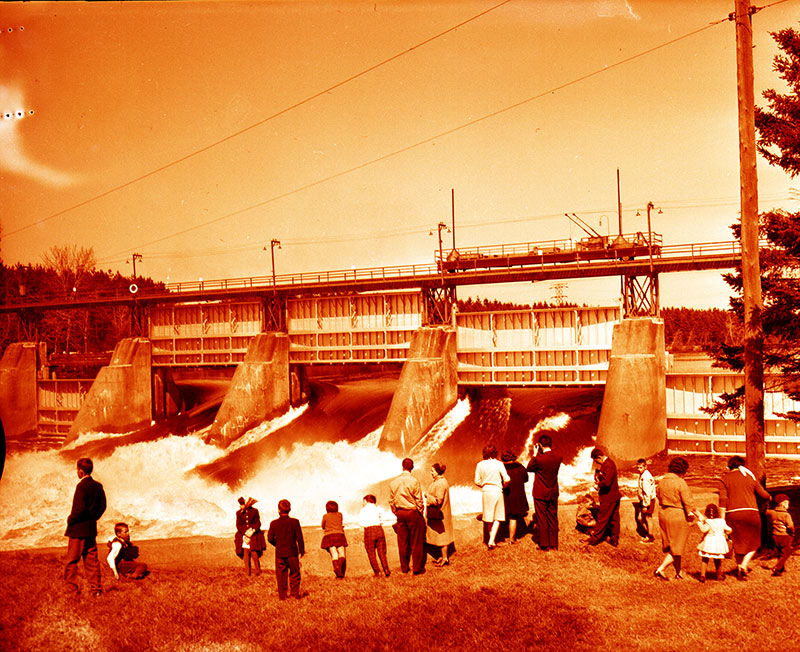 People admiring the falls when the Almaville spillway opens in spring
