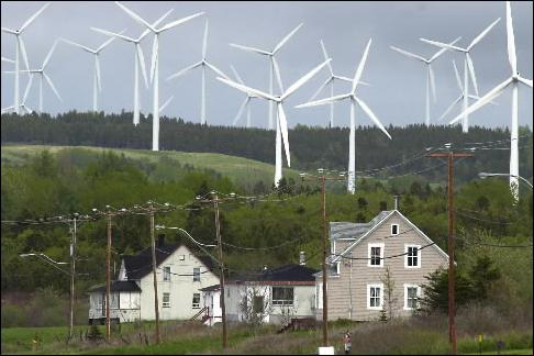 Photo of several wind turbines in action