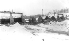 December 1912, work continues on the Melville spillway